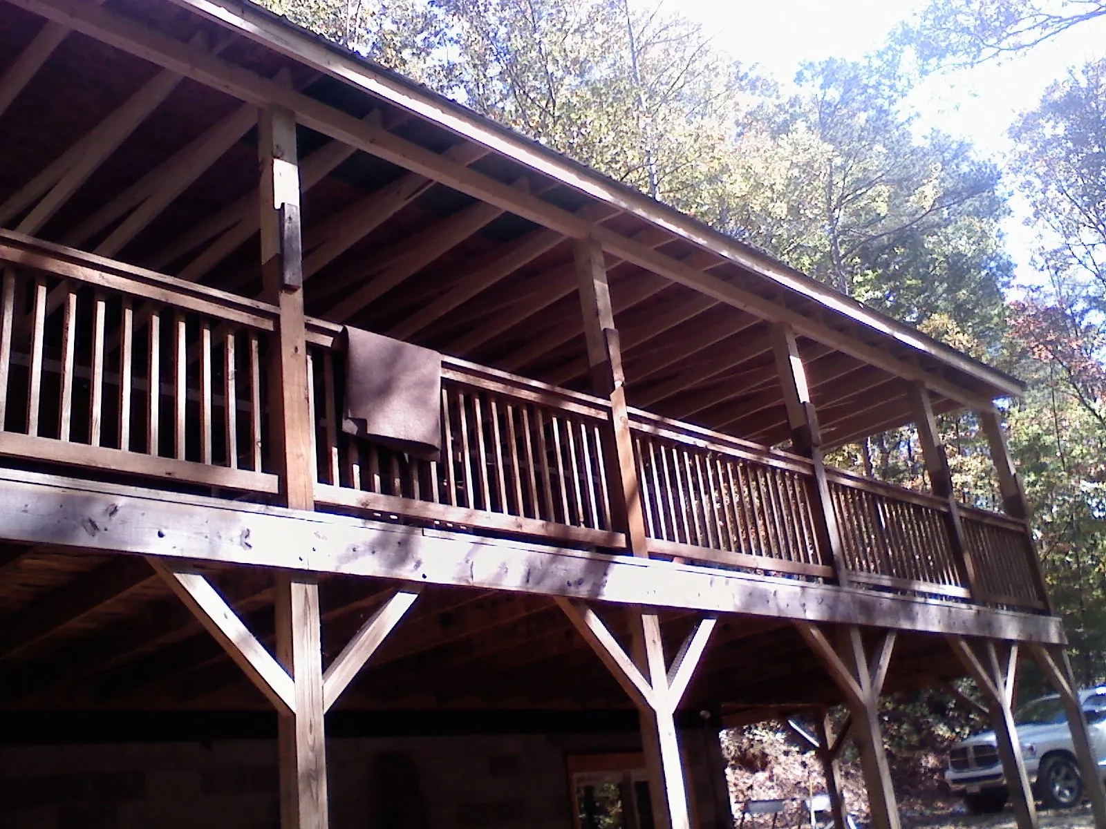 Timber framing under a new elevated porch and deck — Roof Leak Repair in Middlesex by Roofing Brothers